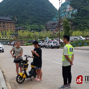 江华水口镇新时代文明实践所开展文明交通劝导活动